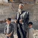 CH1725205_Afghan_refugees_Mirwais,_45,_and_his_two_sons,_Abdul,_7,_and_Elham,__3,_in_a_refugee_camp_in_Balochistan,_Pakistan_zg_web.jpg