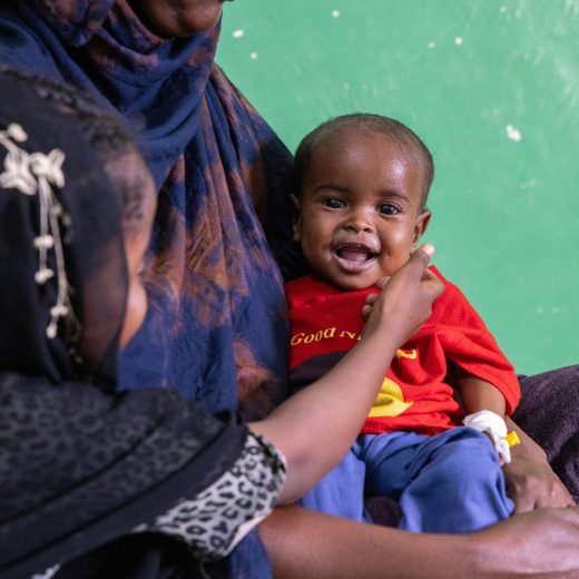 CH11385285_Faisa with her daughters Ikran, 7 months old, and Salma, 9, at a stabilisation centre.jpg